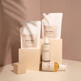 Charger l'image dans la visionneuse de la galerie, Patomia Bark Bliss dog grooming refill pouches and glass spray bottles with cedarwood, vetiver, and palmarosa scents.
