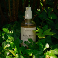 Charger l'image dans la visionneuse de la galerie, Patomia Pawness Bark Bliss natural nourishing dog shampoo in a pump bottle nestled among green ivy leaves