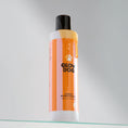Charger l'image dans la visionneuse de la galerie, Patomia Glow Dog 2-in-1 vitamin shampoo and conditioner for dogs in a 250ml bottle with orange striped label.