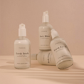 Charger l'image dans la visionneuse de la galerie, Patomia collection of Pawness Fresh Fetch and Bark Bliss dog conditioners in clear pump bottles on a beige background.