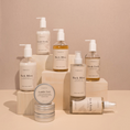 Charger l'image dans la visionneuse de la galerie, Patomia Pawness dog grooming collection including Bark Bliss conditioner and Fresh Fetch shampoo on wooden blocks