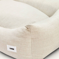 Charger l'image dans la visionneuse de la galerie, Patomia Snozy beige linen and viscose dog bed with a soft, breathable fabric and a small branded label.