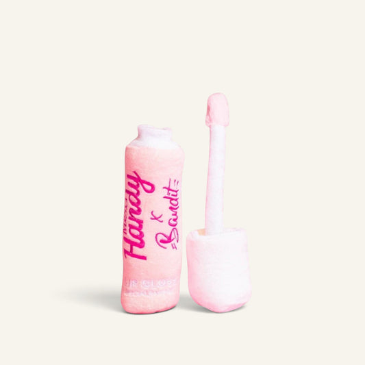 Patomia Bandit x Merci Handy plush dog toy shaped like a pink lip gloss with a squeaker inside