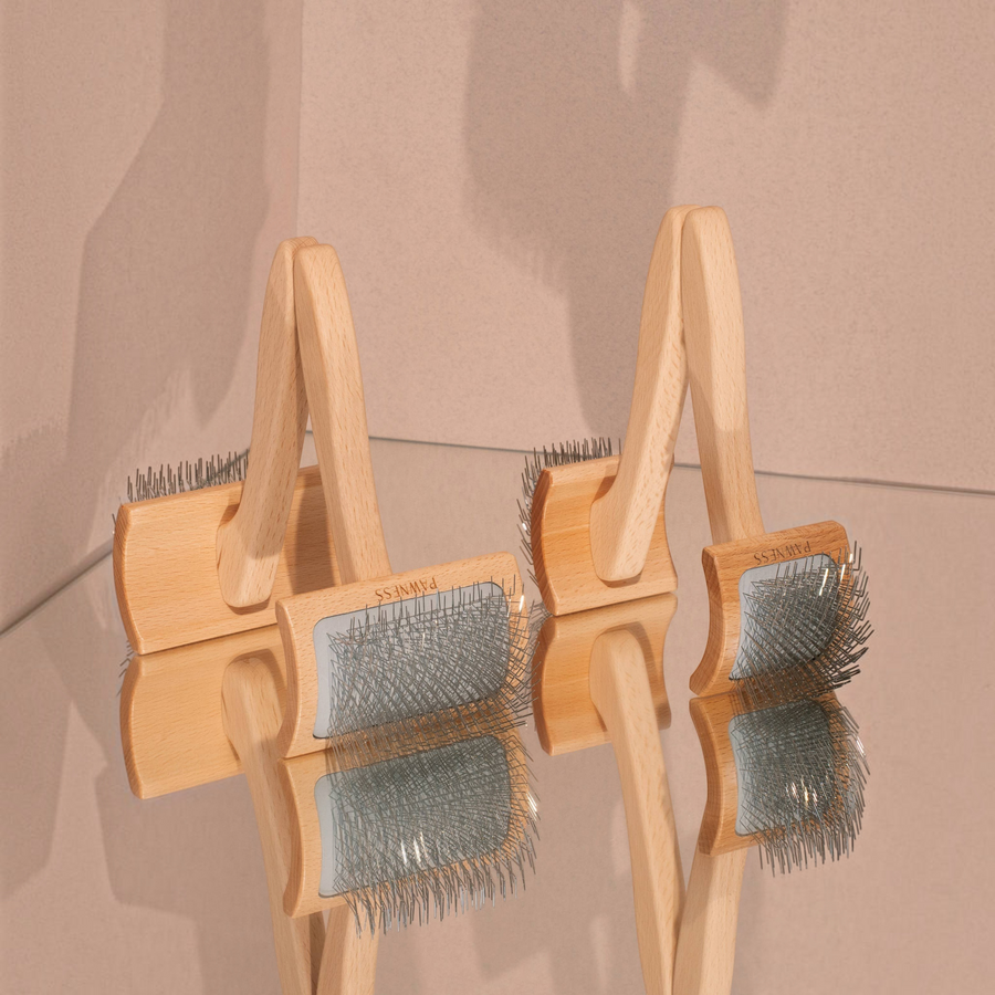 Patomia curved slicker brush with beech wood handle and metal pins for detangling thick dog coats