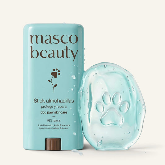 Patomia dog paw protective balm stick in light blue packaging with a clear gel paw print texture