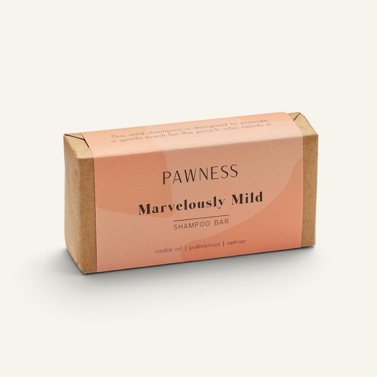 Patomia dog shampoo bar in eco-friendly kraft paper packaging with a soft peach label featuring cedar and vetiver
