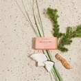 Charger l'image dans la visionneuse de la galerie, Patomia dog shampoo bar with cocoa butter, coconut, and essential oils on a speckled surface with natural botanicals.

