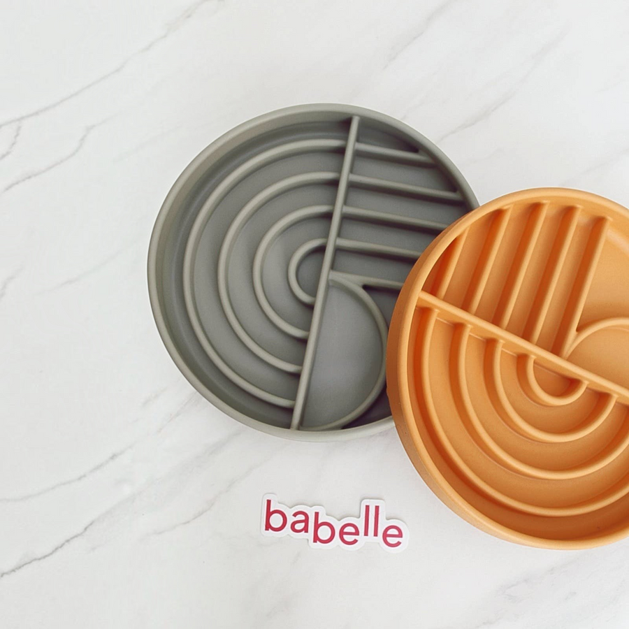 Patomia The Dreamy round silicone lickmats in green and orange with arch patterns for pet enrichment and slow feeding.