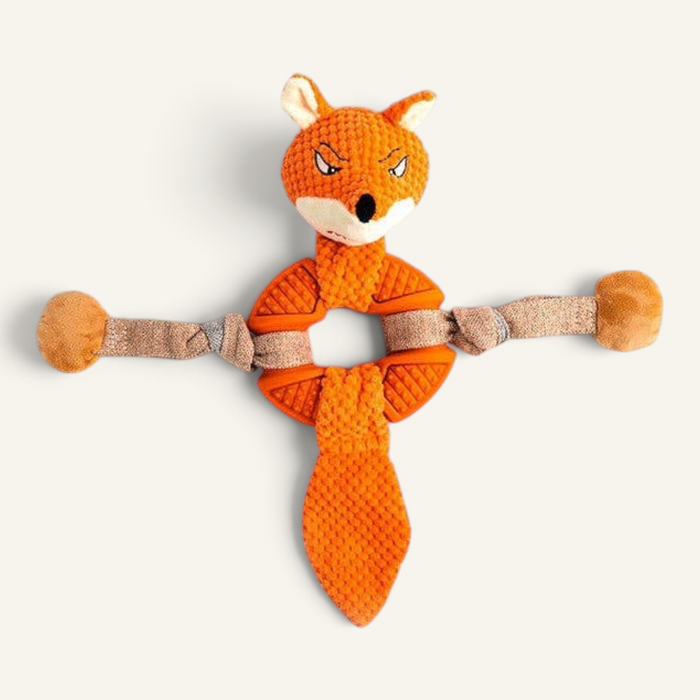 Patomia fox-shaped dog toy with a textured rubber ring, plush fabric, and knotted rope arms for interactive play.