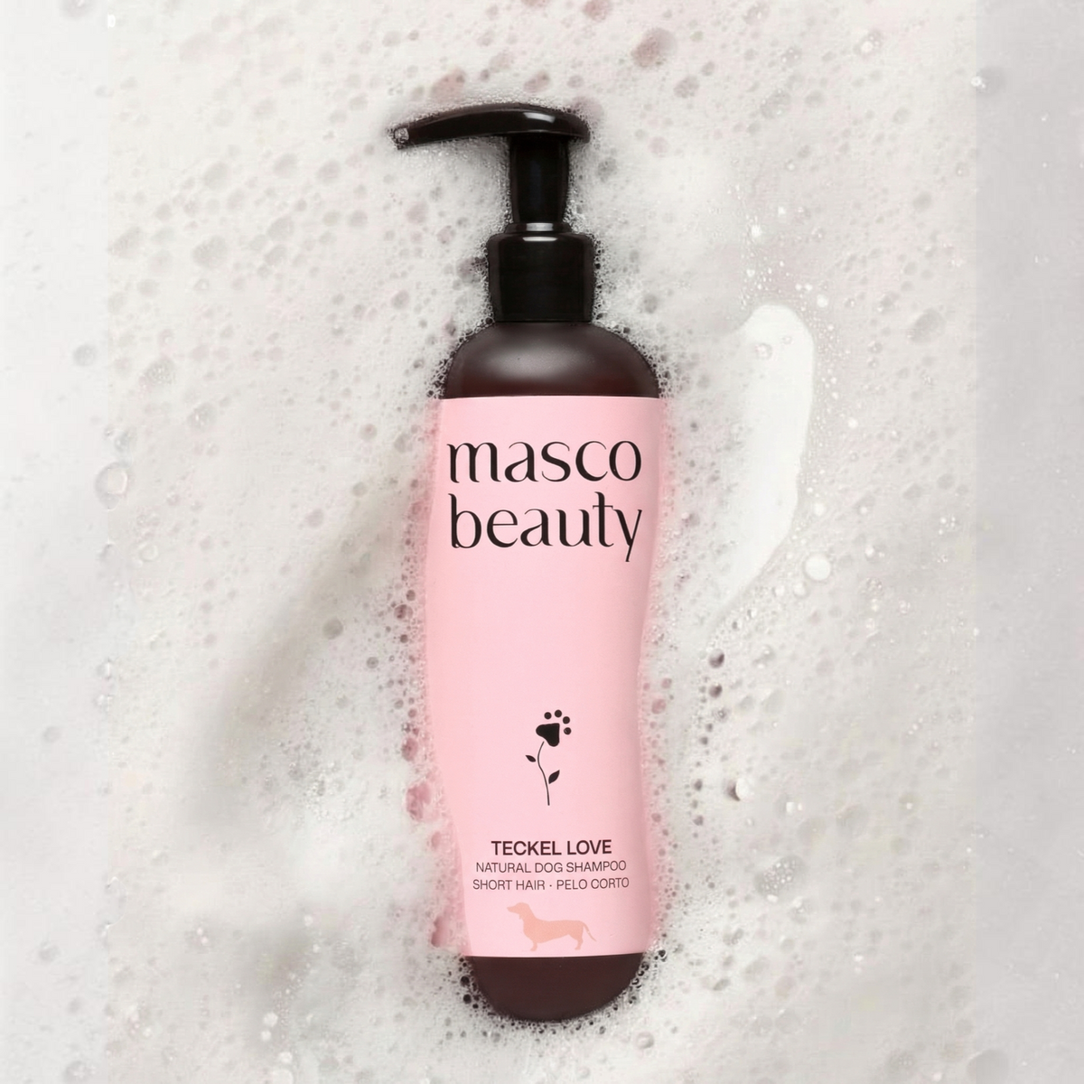 Patomia natural dog shampoo for short-haired breeds like dachshunds in a pink bottle with a pump dispenser
