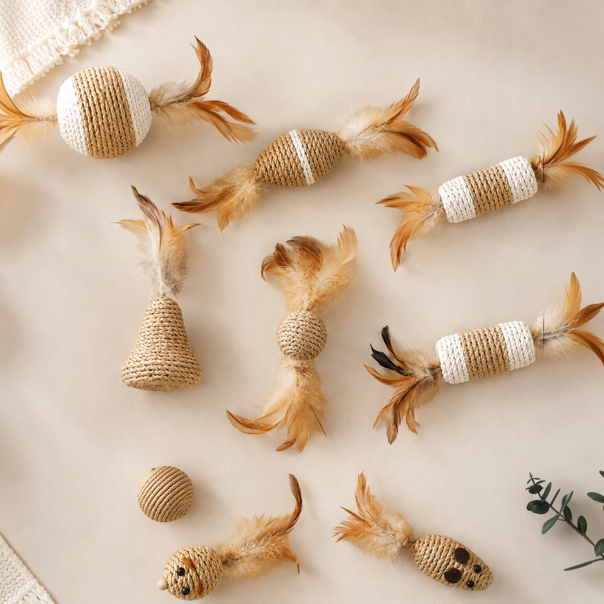 Patomia natural sisal cat toys with feathers, bells, and braided rope textures in various animal-inspired shapes