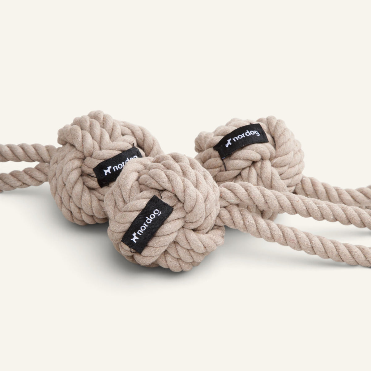 Patomia Nordog taupe organic cotton rope dog toy with three knotted balls for durable play and training