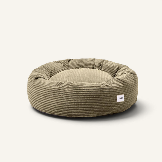 Patomia Nuba round dog bed in soft green corduroy fabric with removable cover and recycled foam filling