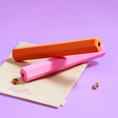Charger l'image dans la visionneuse de la galerie, Patomia orange and pink hexagonal treat tubes for dog enrichment on a beige cotton pouch with small treats
