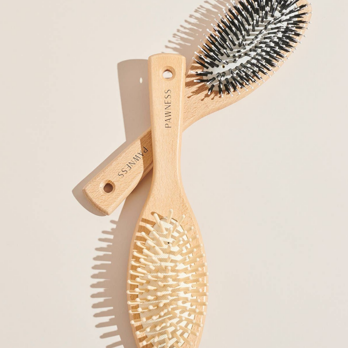 Patomia Pawness wooden dog brushes with nylon bristles for short hair, featuring FSC-certified beech wood handles.