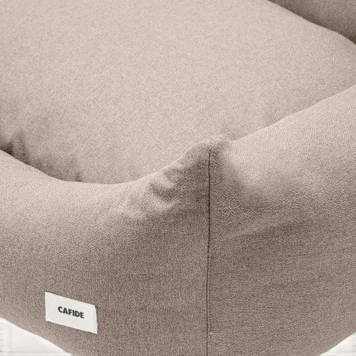 Patomia Snozy beige dog bed with soft polyester fabric and removable cover for easy cleaning