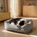 Charger l'image dans la visionneuse de la galerie, Patomia Snozy grey dog bed with a soft polyester cover and recycled foam filling, featuring a resting border collie.
