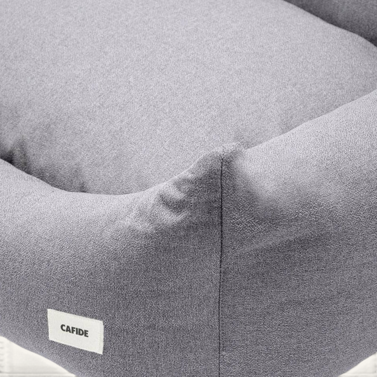 Patomia Snozy grey dog bed with soft polyester fabric and a removable cover for easy cleaning.