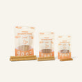 Charger l'image dans la visionneuse de la galerie, Patomia Stitch dental sticks for dogs in three sizes, made with natural cheese and rice for dental health.

