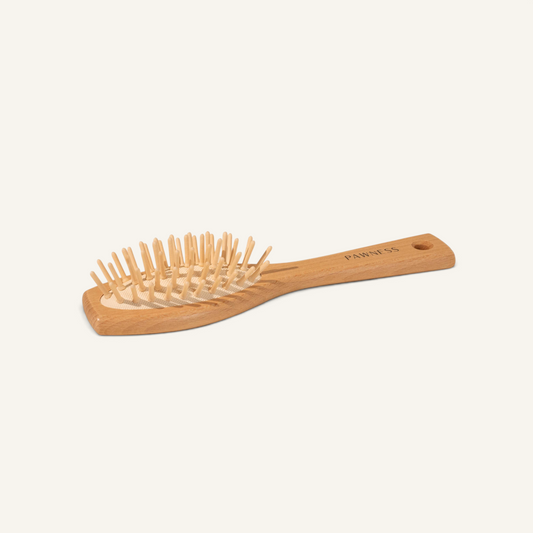 Patomia wooden dog brush with rounded bristles for long, fine hair, crafted from sustainable beech wood.