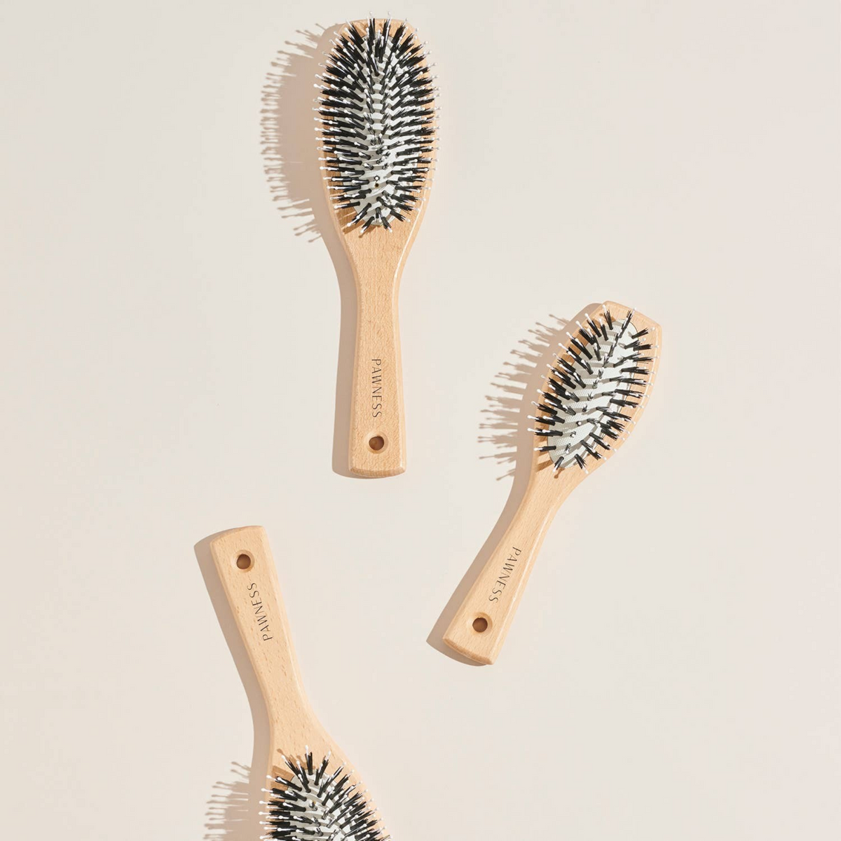 Patomia wooden dog brushes with nylon bristles for short-haired dogs, featuring FSC-certified beech wood handles.