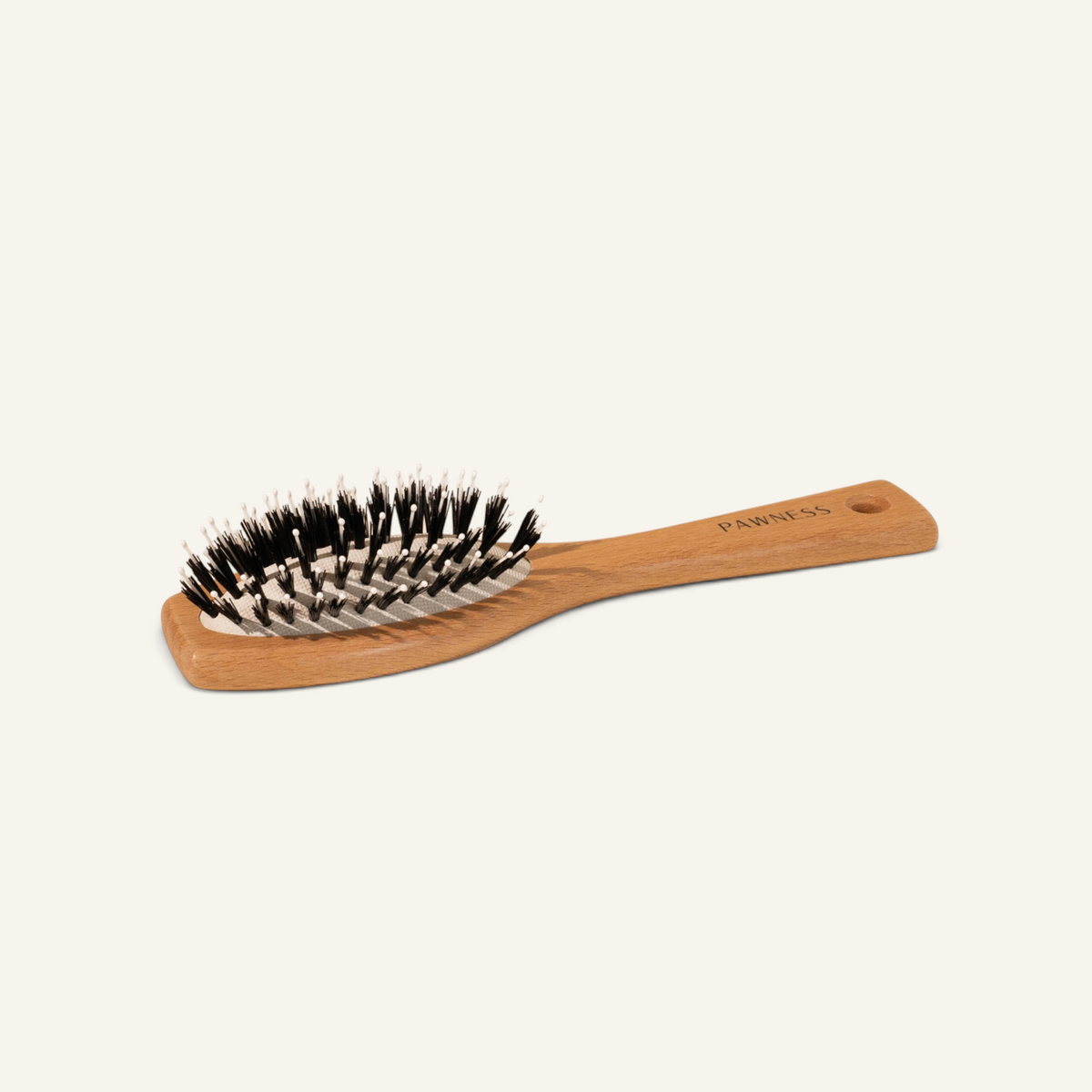 Patomia wooden dog brush with nylon bristles for short-haired dogs, featuring a sustainable beech wood handle.